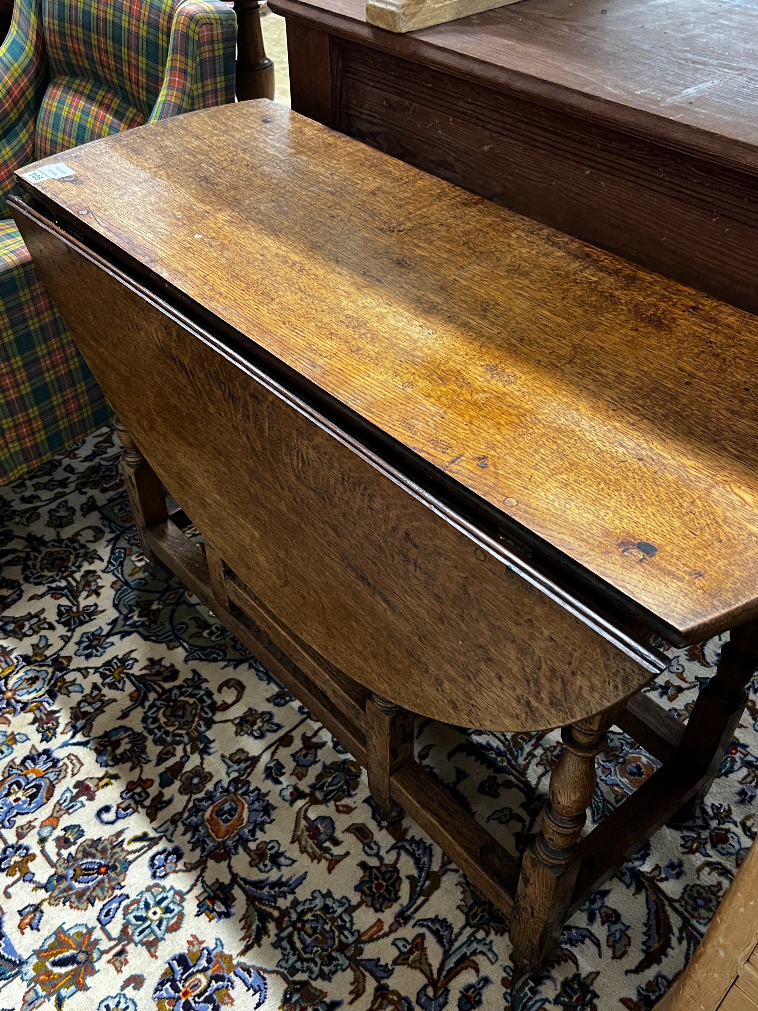 An 18th century oak gateleg table, length 102cm, depth 40cm, height 71cm